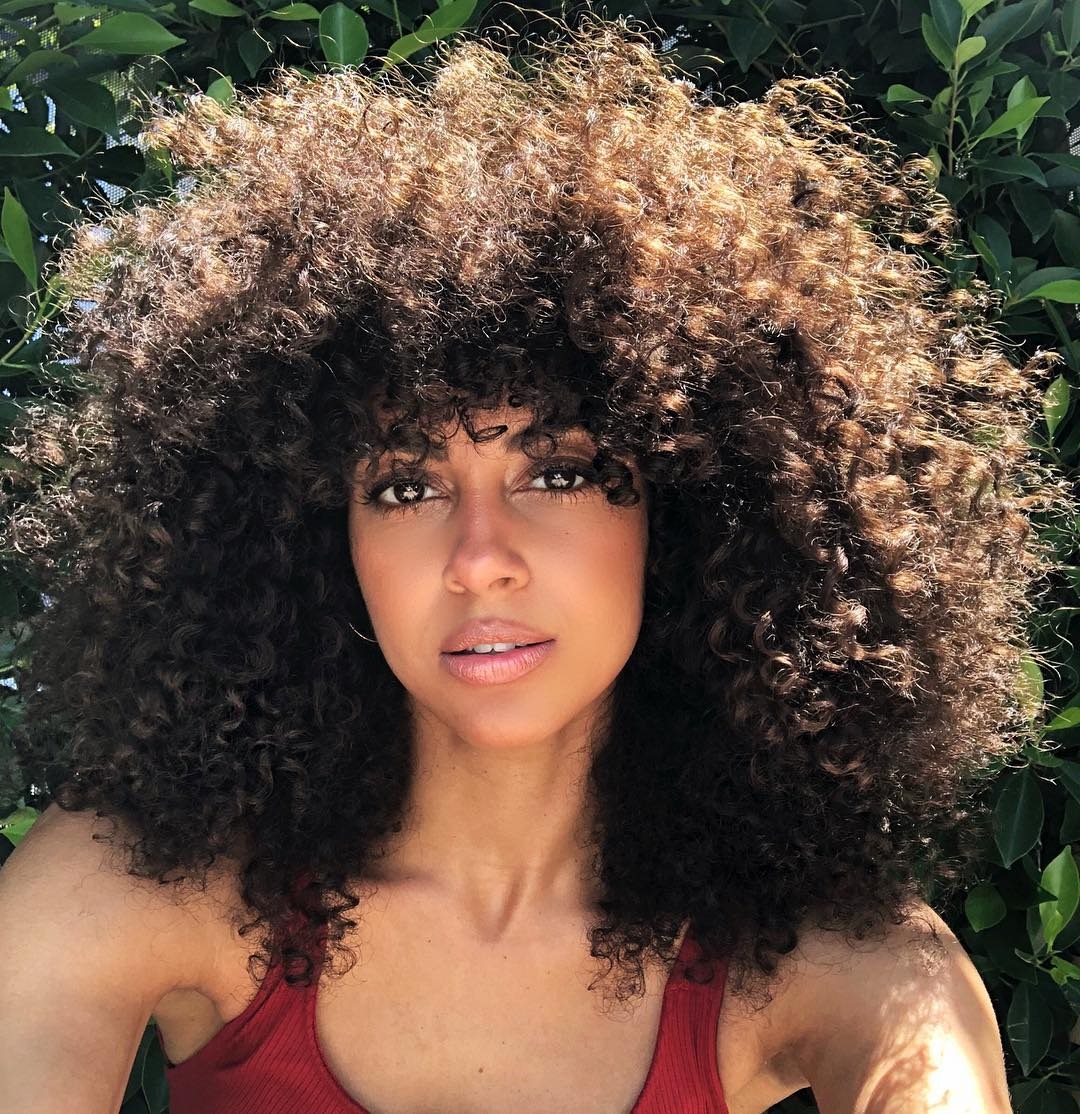 Woman with natural curly hair